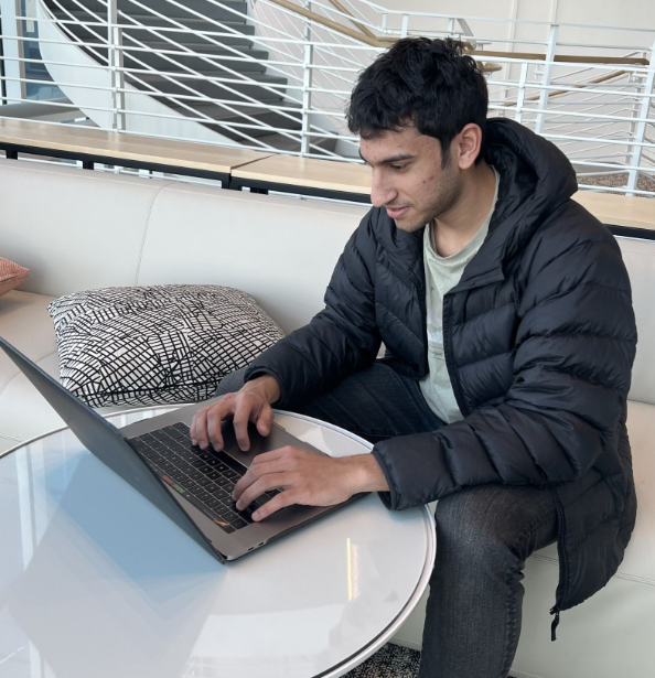 Arnav Mardia working at a laptop